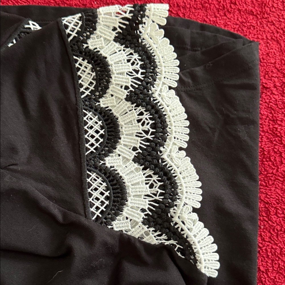 Elegant Black Top with Lace Sleeves
